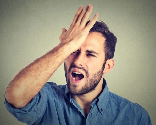 Regrets wrong doing. Man having a duh moment